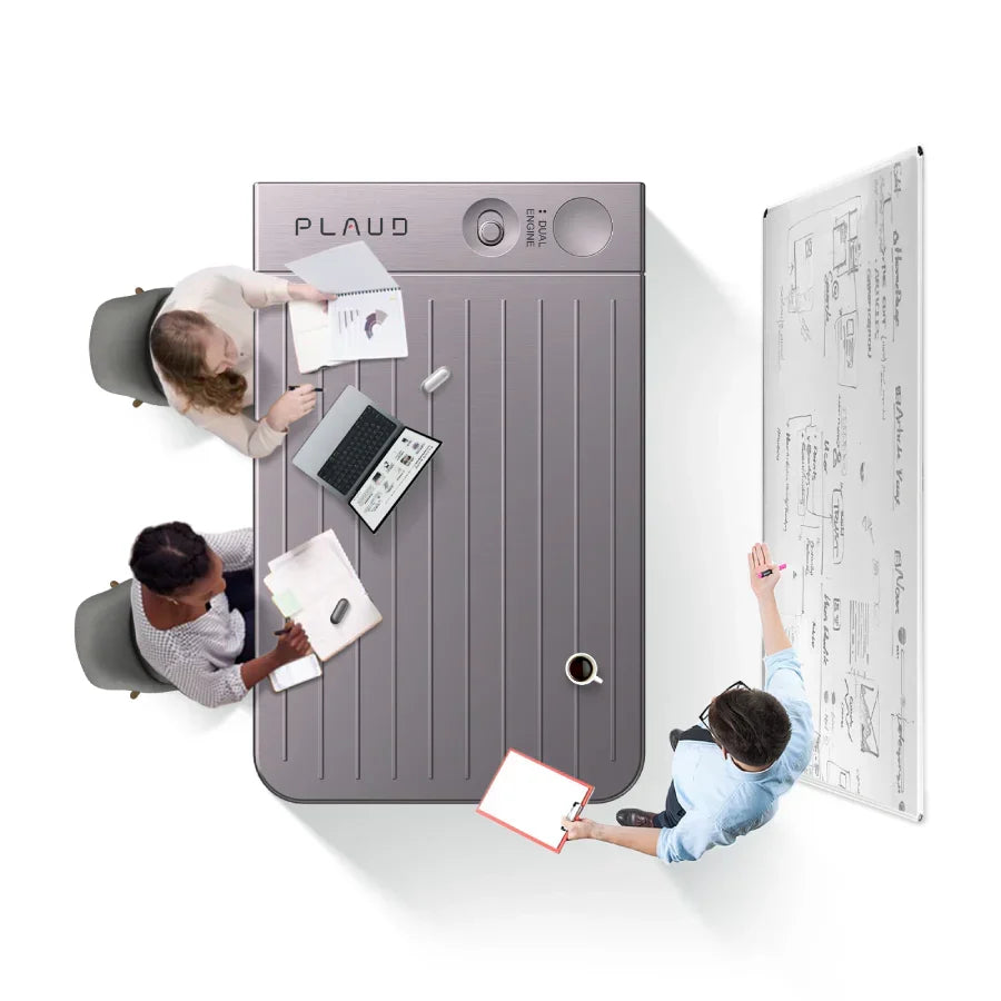 People meeting around a table shaped like a gray Plaud Note AI voice recorder.