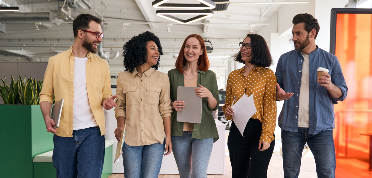 Professionals collaborating with Plaud AI note takers in a modern workplace.
